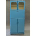 A vintage mid-20th century blue painted kitchen cabinet. 178 cm high.