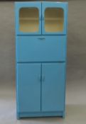 A vintage mid-20th century blue painted kitchen cabinet. 178 cm high.