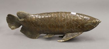 A brass model of a fish. 43 cm long.