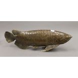 A brass model of a fish. 43 cm long.