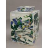 A large Chinese square section porcelain jar and cover. 26 cm high.
