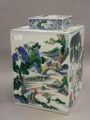 A large Chinese square section porcelain jar and cover. 26 cm high.