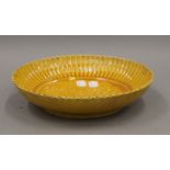 A Chinese yellow ground porcelain plate. 22.5 cm diameter.