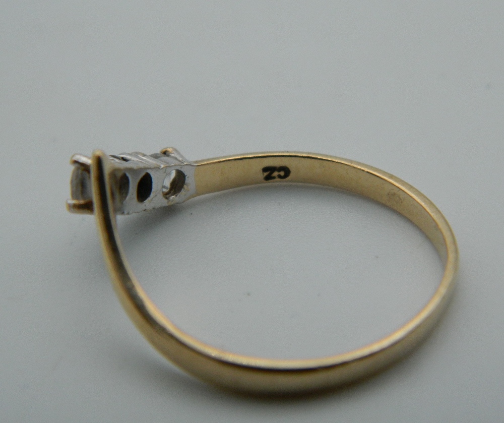A 9 ct gold diamond and sapphire wishbone ring. Ring size M (1. - Image 2 of 3