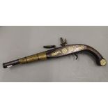 An Antique Eastern flintlock pistol. 41 cm long.