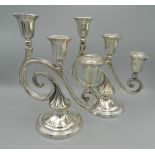 A pair of three branch sterling silver candlesticks. 22 cm high (25.6 troy ounces weighted).