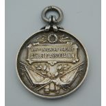 A 1917 silver military medallion.