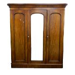 A Victorian mahogany triple wardrobe. 190 cm wide.