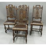 A set of four 19th century carved oak dining chairs. 44 cm wide.