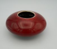 A Chinese peach bloom porcelain brush washer. 12.5 cm diameter.