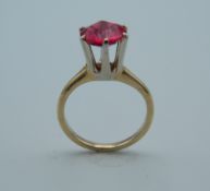 A 14 K yellow gold and solitaire ruby ring. Approximately 2.5 carats. Ring size L.