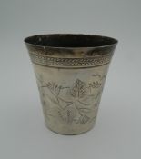 An engraved antique Turkish silver beaker. 9 cm high (2.9 troy ounces).