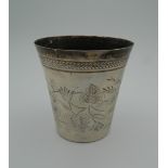 An engraved antique Turkish silver beaker. 9 cm high (2.9 troy ounces).