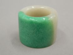 A Chinese jade archers ring. 2.5 cm high.