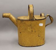 A Victorian toleware hot water can. 25 cm high.