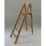 A vintage wooden step ladder. 155 cm high.