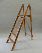 A vintage wooden step ladder. 155 cm high.