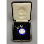 A French silver blue enamel with gold inlay fob watch. 2.5 cm diameter.