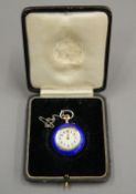 A French silver blue enamel with gold inlay fob watch. 2.5 cm diameter.