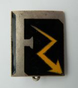 A WWII French enamel fascist badge