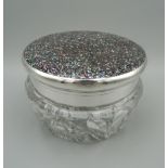 A fine quality hinged glass and silver jar with abalone shell mosaic lid, import marks to silver.