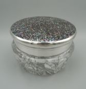 A fine quality hinged glass and silver jar with abalone shell mosaic lid, import marks to silver.