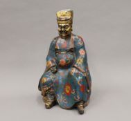 A bronze cloisonne figure of a deity. 30 cm high.