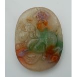 A multi coloured jade pendant. 6 cm high.