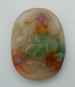 A multi coloured jade pendant. 6 cm high.