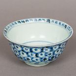 An 18th century Chinese blue and white porcelain bowl, of deep flared form. 14.5 cm diameter.