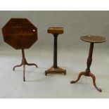 Three mahogany tripod tables. The largest 46.5 cm wide.