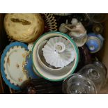 A large box of decorative ceramics and glass