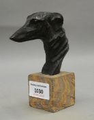 A patinated bronze greyhound bust on stand. 13 cm high.