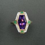 A 9 ct gold Art Deco style emerald, diamond and amethyst ring, in the Suffragette colours.