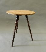 A Victorian oak and pine gypsy table. 55 cm diameter.