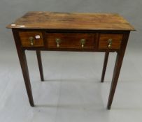 A 19th century mahogany three drawer side table. 74 cm wide.