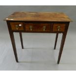 A 19th century mahogany three drawer side table. 74 cm wide.