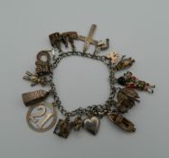 A silver charm bracelet (56.