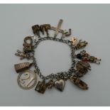 A silver charm bracelet (56.