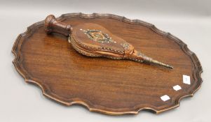 An early 20th century mahogany tray and a set of inlaid rosewood bellows.