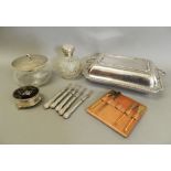 A silver top dressing pot, a scent bottle, a trinket box and a plated entree dish.