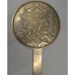 A Japanese bronze hand mirror. 18 cm wide.