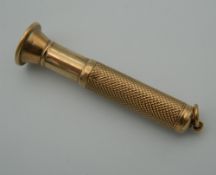 A 9 ct gold cigar pricker. 6.5 cm long (16.