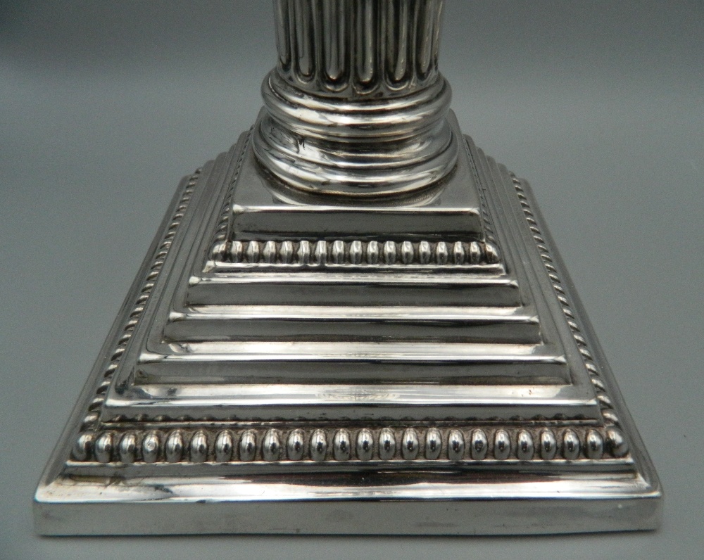 A pair of hallmarked English silver Corinthian column candlesticks. One sconce lacking. 31 cm high. - Image 3 of 8