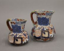 Two 19th century Davenport Imari pattern jugs. The largest 11 cm high.