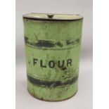 A Victorian toleware flour tin. 33 cm high.