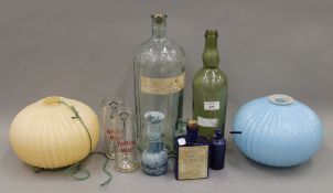 A quantity of glass bottles, etc.