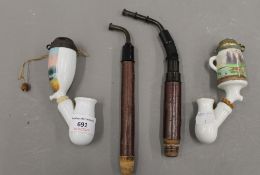 Two Bavarian porcelain pipes. The largest 26 cm high.