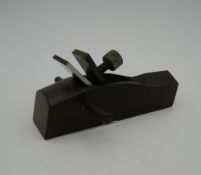 A small bronze wood working plane. 8.5 cm long.