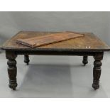 A Victorian carved oak single leaf extending dining table. 190 cm extended.